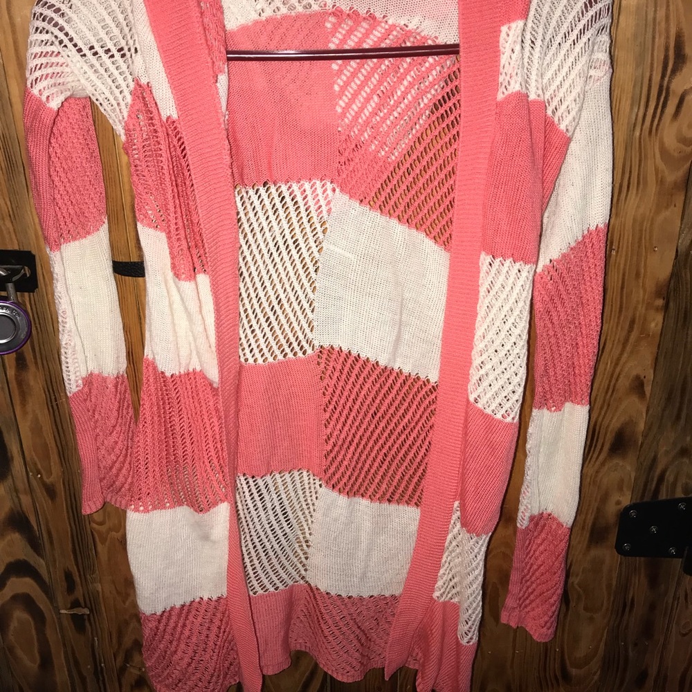 Peach and white colored cardigan